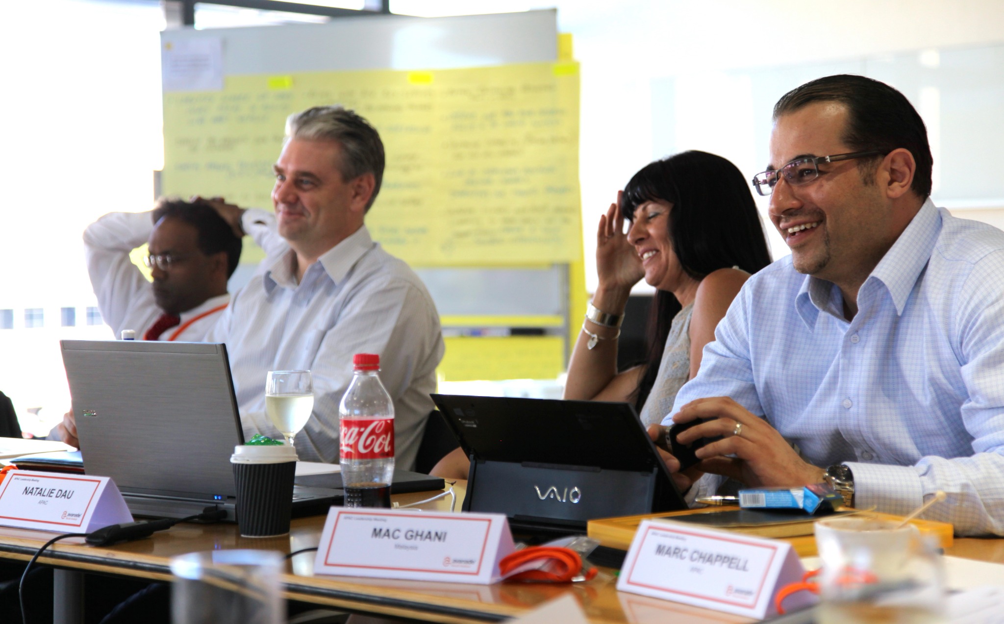 Seminar participants working together in conversation.